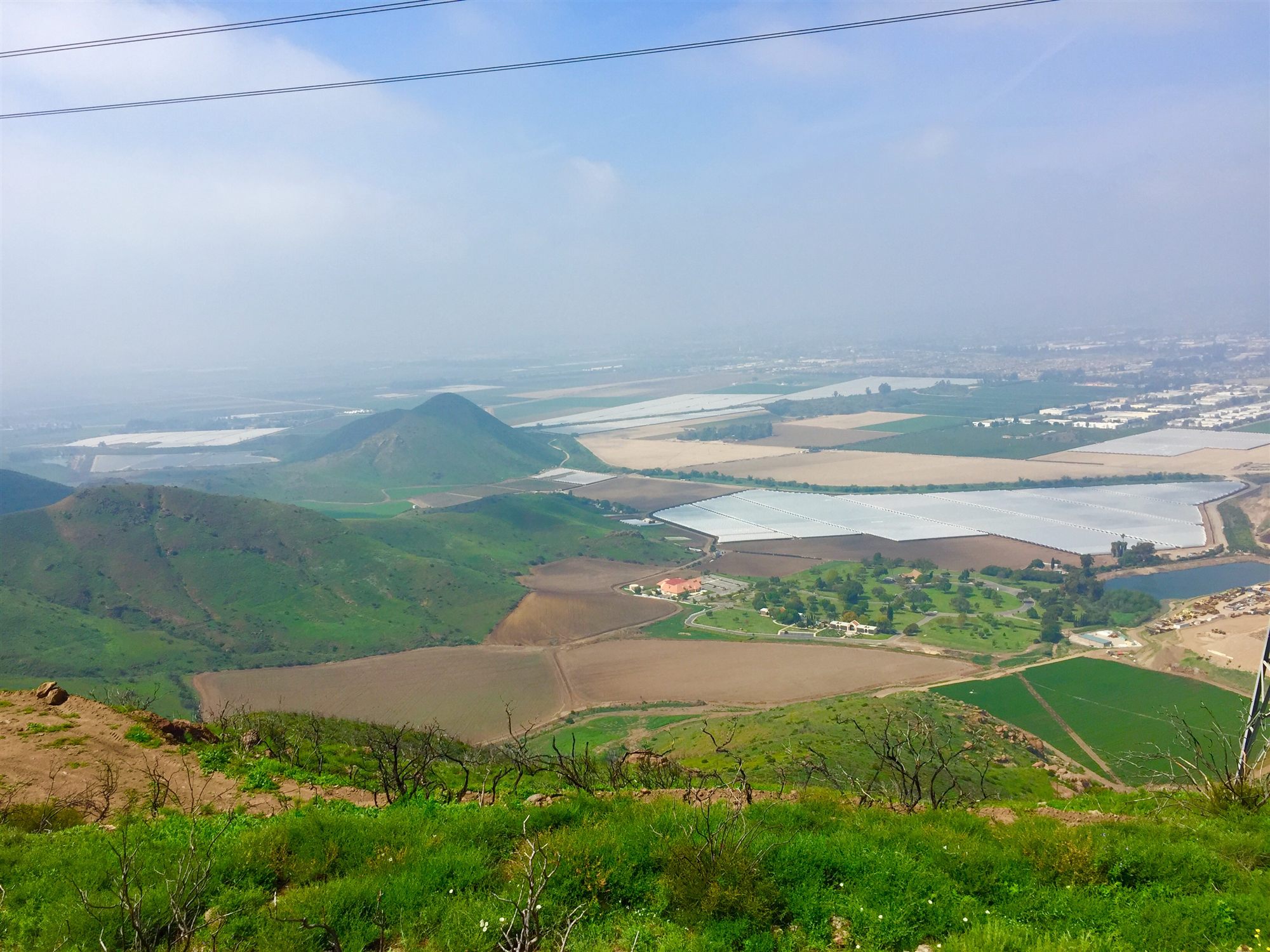 Camarillo seen from the Conejo Grade: green hills giving way to the farm fields of the Oxnard Plain