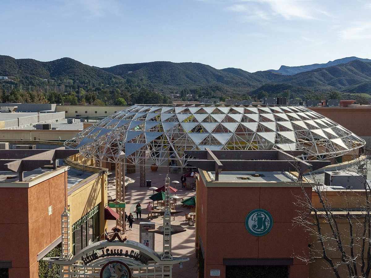 The courtyard of Janss Marketplace under its domed canopy, with the hills of the Conejo Valley behind
